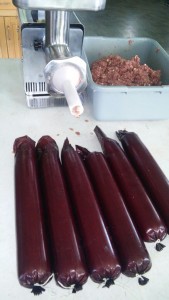 The Eicher family recipe for summer sausage is a large one—calling for 100 pounds of hamburger and sausage. They added either cheddar or hot pepper cheese to some of the sausage. 